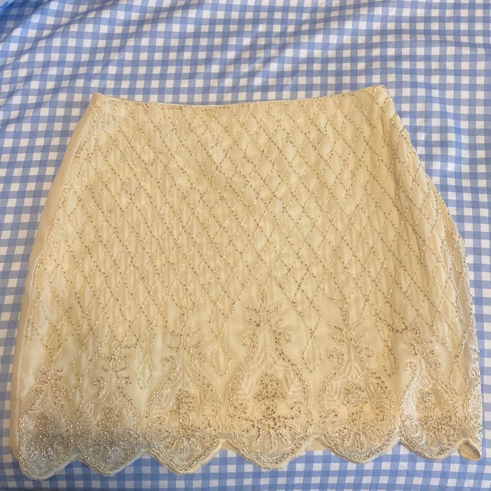 Size small beaded ivory skirt